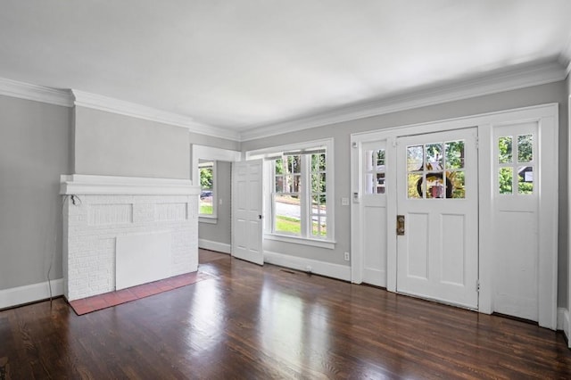 1585 Olympian Cir SW, Atlanta, GA 30310 - foyer entrance with a fireplace, wood finished floors, and crown molding