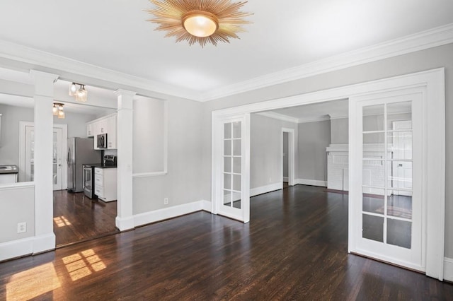 1585 Olympian Cir SW, Atlanta, GA 30310 - spare room with dark wood-type flooring, crown molding, decorative columns, and french doors