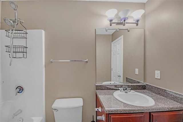 bathroom with shower / bathtub combination, vanity, and toilet