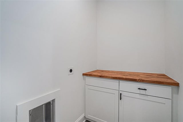 clothes washing area featuring electric dryer hookup