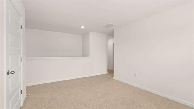 unfurnished room featuring recessed lighting, baseboards, and carpet floors