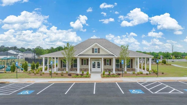 view of property with uncovered parking