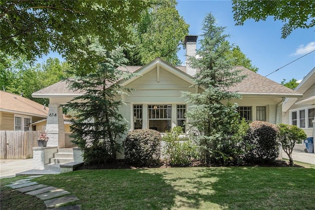 614 Cooledge Ave NE, Atlanta, GA 30306 - rear view of house featuring a chimney and roof with shingles