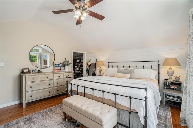 614 Cooledge Ave NE, Atlanta, GA 30306 - bedroom featuring wood finished floors, lofted ceiling, a spacious closet, ceiling fan, and baseboards