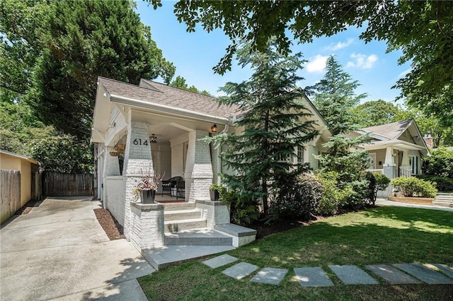 614 Cooledge Ave NE, Atlanta, GA 30306 - view of front of property with covered porch and brick siding
