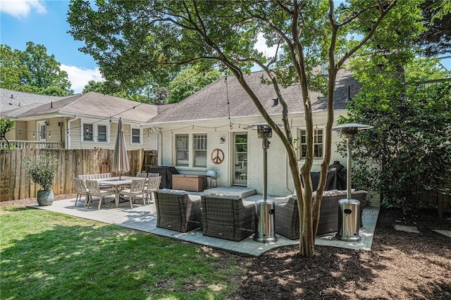 614 Cooledge Ave NE, Atlanta, GA 30306 - rear view of house with a patio area, brick siding, and a shingled roof