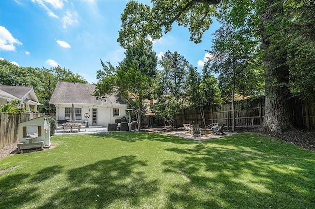 614 Cooledge Ave NE, Atlanta, GA 30306 - view of yard featuring a fire pit and a patio area