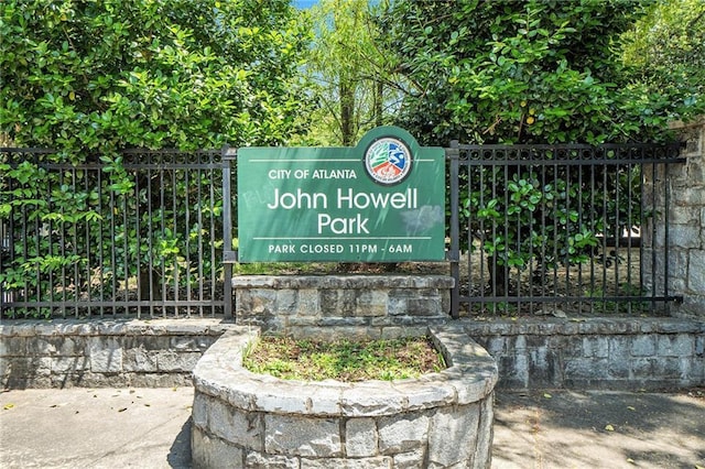 614 Cooledge Ave NE, Atlanta, GA 30306 - community / neighborhood sign featuring a gate and fence
