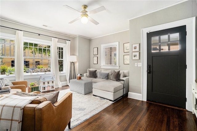 614 Cooledge Ave NE, Atlanta, GA 30306 - living room with dark wood-type flooring, a ceiling fan, crown molding, and baseboards