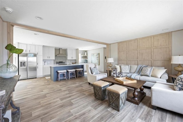 living area featuring light wood-style floors