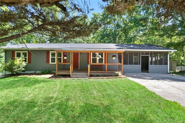 444 Polk Ln, Dallas, GA 30132 - ranch-style home featuring a sunroom, a front yard, and driveway