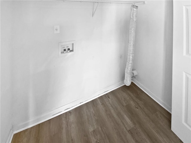 clothes washing area with washer hookup, dark wood finished floors, baseboards, hookup for an electric dryer, and laundry area