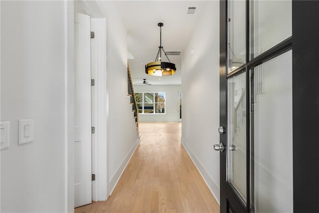 hallway featuring light hardwood / wood-style flooring