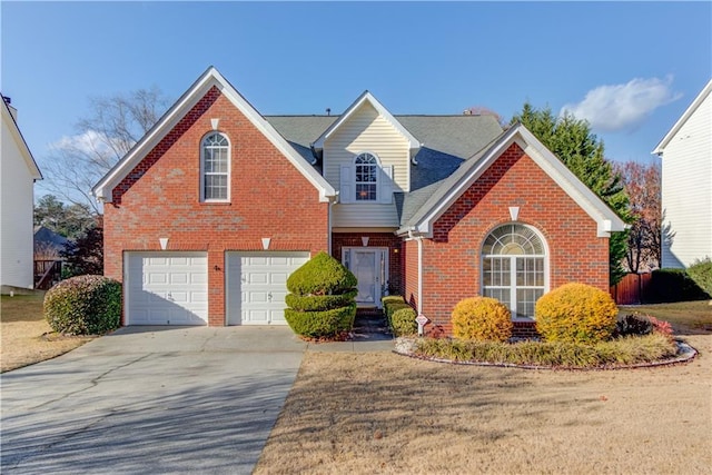 front of property with a garage