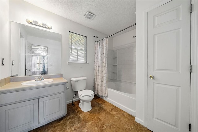 125 Fairhaven Trl, Fairburn, GA 30213 - full bath featuring vanity, toilet, a textured ceiling, shower / bath combo, and baseboards