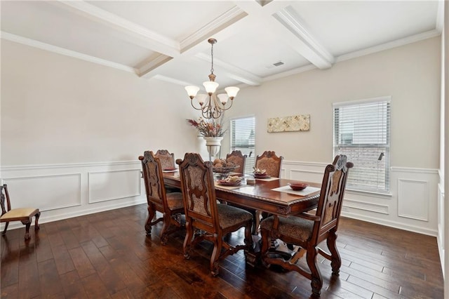 dining space with an inviting chandelier, visible vents, dark wood-style flooring, and beam ceiling