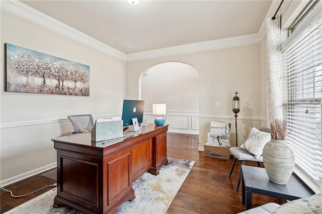 home office with arched walkways, a wainscoted wall, dark wood-style floors, and crown molding