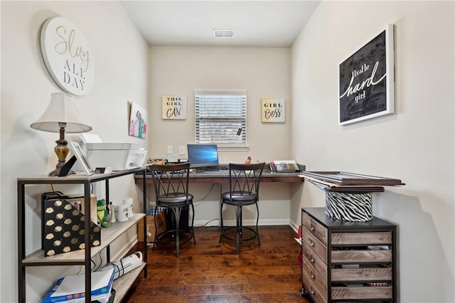 office featuring dark wood-style floors, visible vents, and baseboards