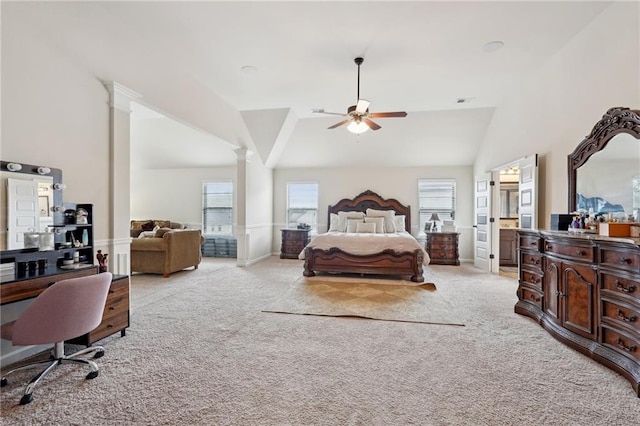 bedroom featuring ornate columns, high vaulted ceiling, and light colored carpet