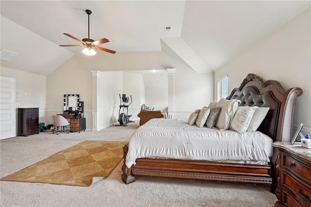 carpeted bedroom with visible vents, vaulted ceiling, and a ceiling fan