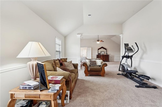 living area featuring ornate columns, ceiling fan, lofted ceiling, and light colored carpet