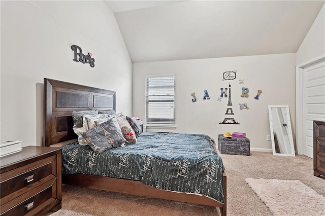 bedroom featuring lofted ceiling, light carpet, and baseboards