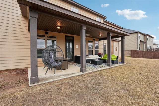 view of patio / terrace with outdoor lounge area and fence