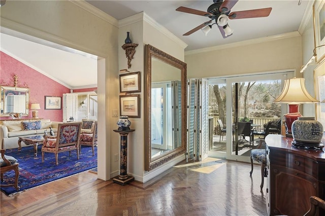 interior space with lofted ceiling, ornamental molding, and a ceiling fan