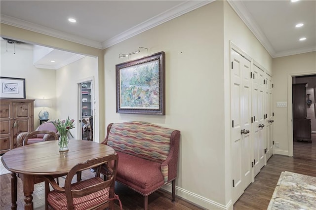 interior space featuring crown molding, dark wood finished floors, and baseboards