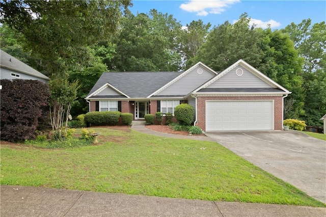 1027 Regency Dr, Acworth, GA 30102 - single story home featuring a garage, brick siding, driveway, and a front lawn