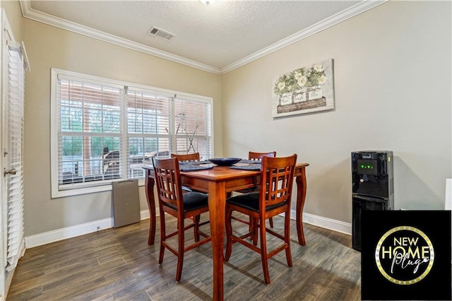 dining space featuring baseboards, visible vents, dark wood-type flooring, and ornamental molding