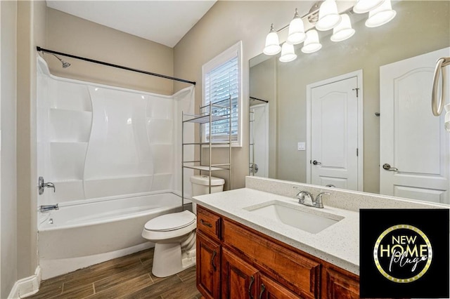 bathroom with shower / bathtub combination, vanity, toilet, and wood finished floors