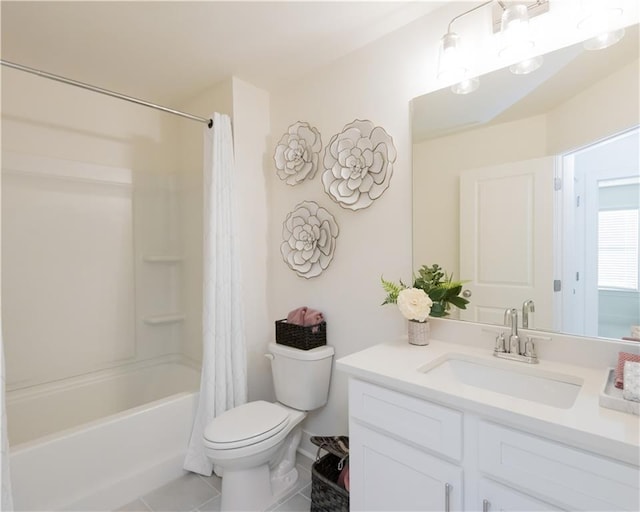 full bathroom with tile patterned flooring, toilet, vanity, and shower / bath combo with shower curtain