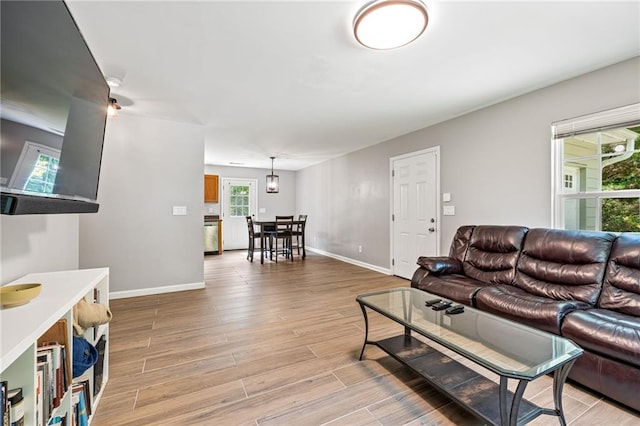 5706 Forest Pl, Acworth, GA 30102 - living room featuring light wood-style flooring and baseboards