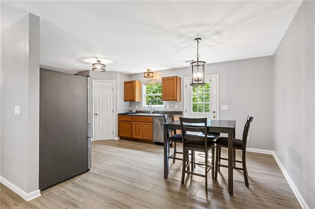 5706 Forest Pl, Acworth, GA 30102 - dining room with baseboards and light wood finished floors