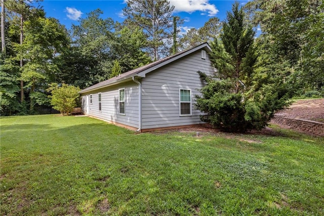 5706 Forest Pl, Acworth, GA 30102 - view of side of home with a lawn