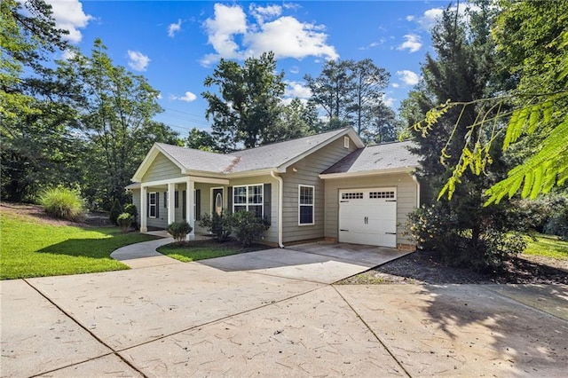 5706 Forest Pl, Acworth, GA 30102 - view of front of home with driveway, an attached garage, and a front yard