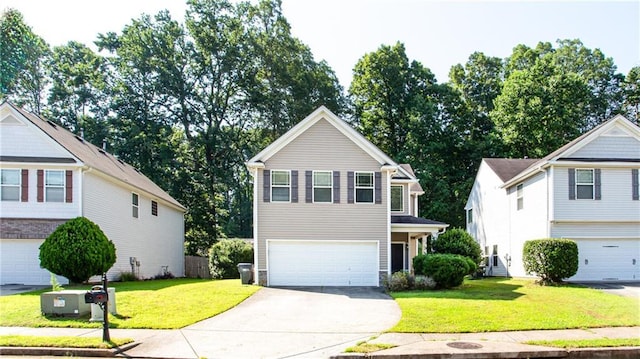 4628 Mcever View Dr, Sugar Hill, GA 30518 - traditional home with concrete driveway, a garage, and a front yard