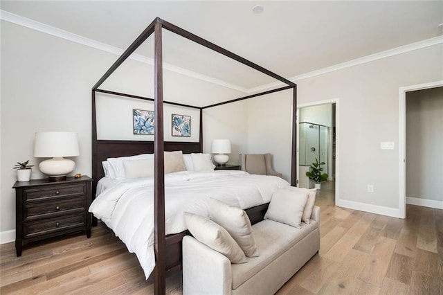 bedroom with ornamental molding and light hardwood / wood-style floors