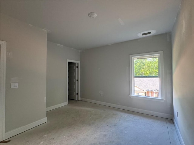 5381 Tuscany Dr, Douglasville, GA 30135 - spare room featuring baseboards and unfinished concrete flooring