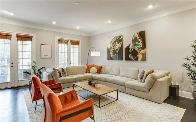 living room featuring hardwood / wood-style flooring, ornamental molding, and french doors