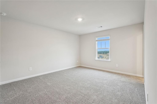 empty room with carpet floors