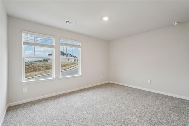 view of carpeted spare room