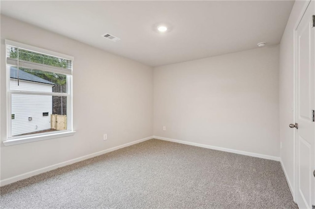 view of carpeted spare room