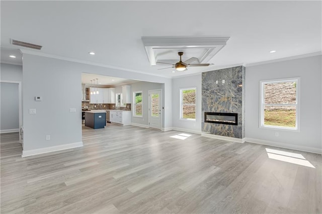 1226 Bloomsbury Ln, Gainesville, GA 30501 - unfurnished living room featuring ornamental molding, a premium fireplace, baseboards, recessed lighting, and ceiling fan