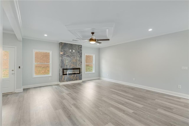 1226 Bloomsbury Ln, Gainesville, GA 30501 - unfurnished living room featuring ornamental molding, ceiling fan, light wood-style flooring, baseboards, and a fireplace
