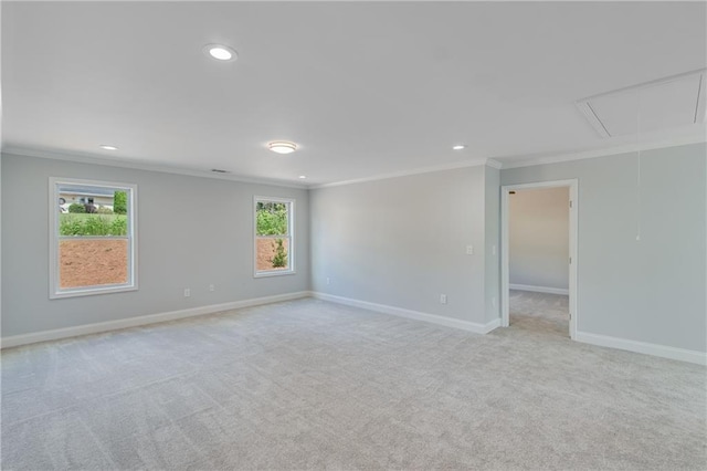 1226 Bloomsbury Ln, Gainesville, GA 30501 - empty room featuring attic access, crown molding, recessed lighting, baseboards, and light colored carpet
