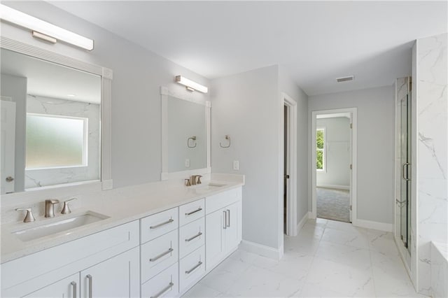 1226 Bloomsbury Ln, Gainesville, GA 30501 - bathroom featuring marble look tile flooring, double vanity, a marble finish shower, and baseboards