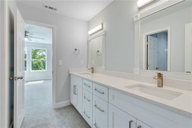 1226 Bloomsbury Ln, Gainesville, GA 30501 - full bathroom with double vanity, baseboards, and ceiling fan