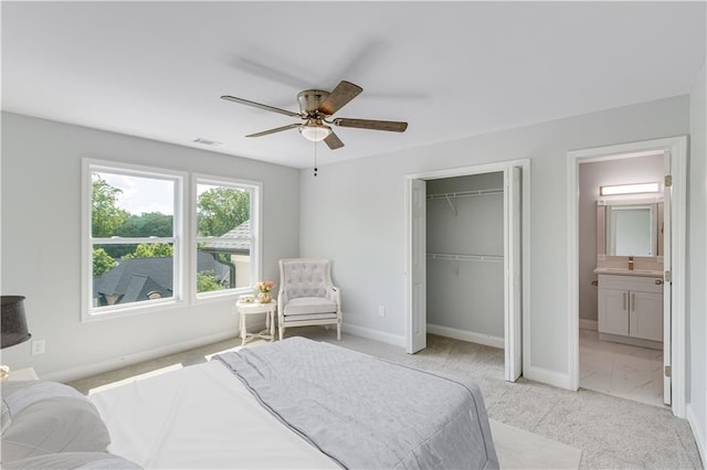 1226 Bloomsbury Ln, Gainesville, GA 30501 - bedroom featuring light colored carpet, baseboards, a closet, and ceiling fan